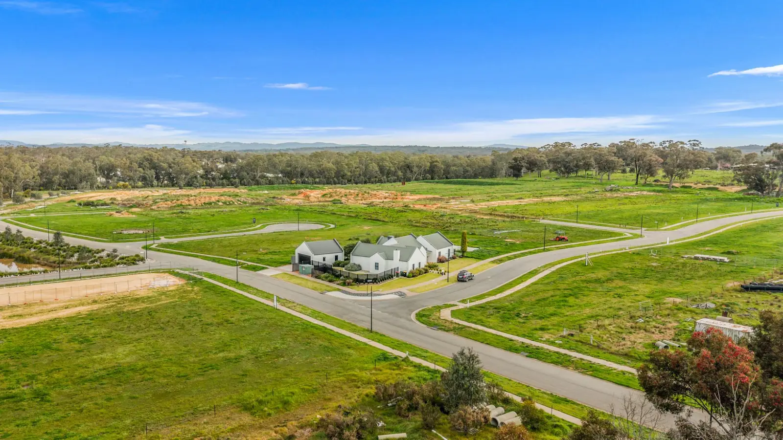 Aerial view over Sommerfields Estate at Strathfieldsaye, with the streets in and a completed home on the corner