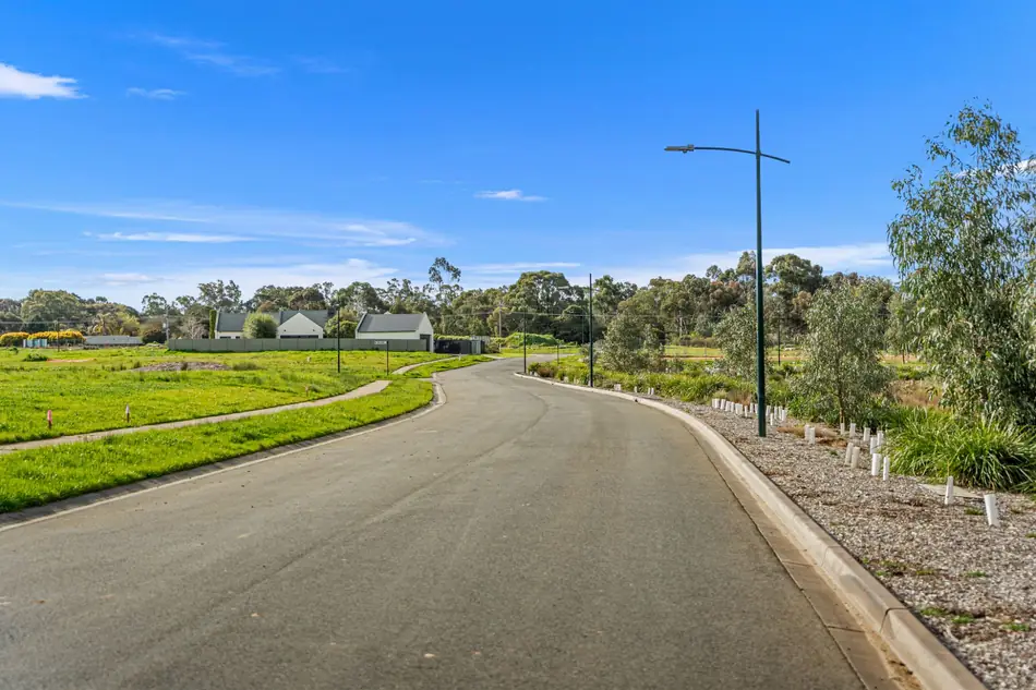 A quiet court at Sommerfields Estate with kerbing, footpaths and street trees in